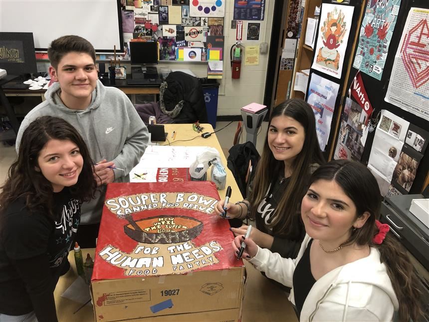 Students creating donation boxes; Ms. Ingraham 